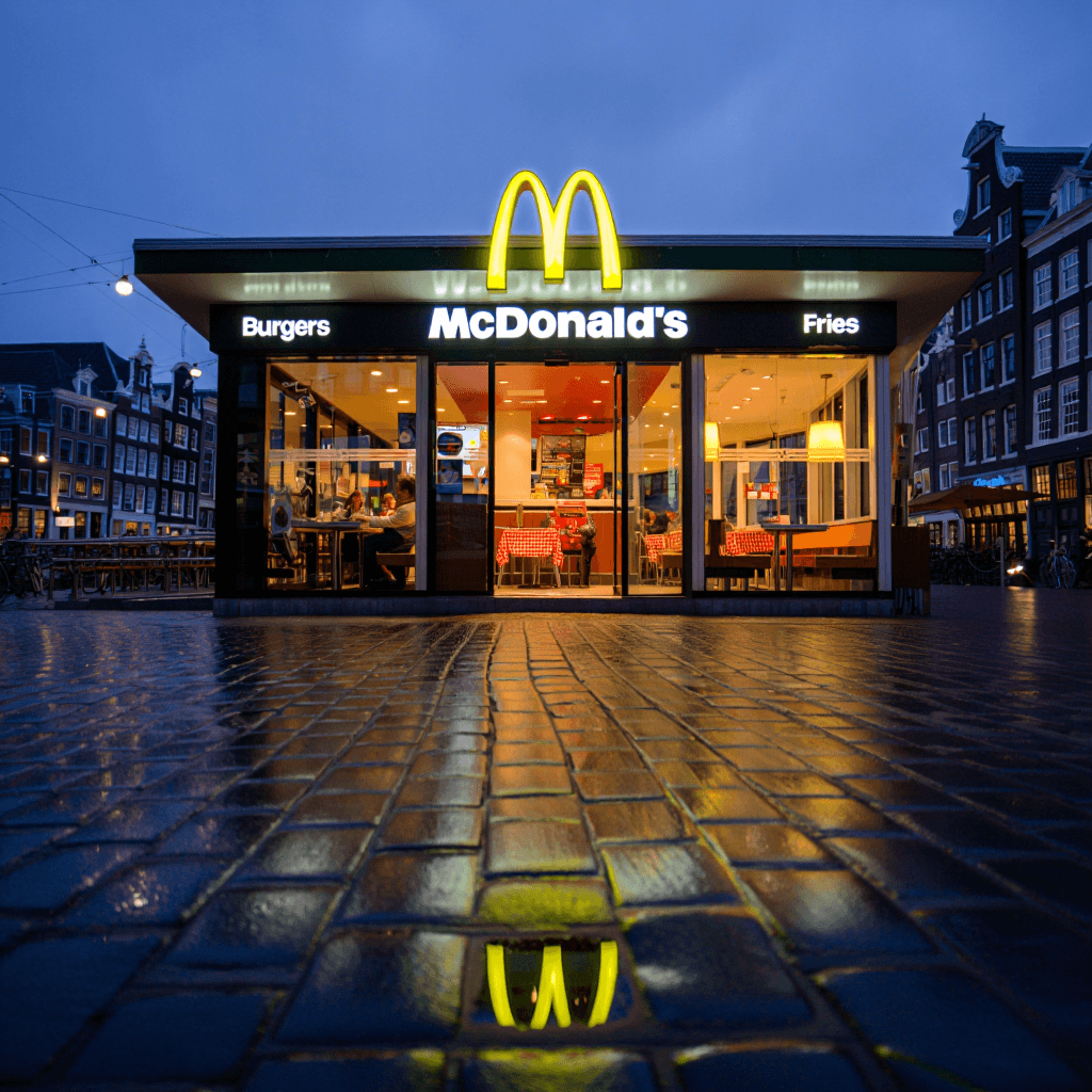 warm fast food counter with bright menu boards and a welcoming service area under warm lighting